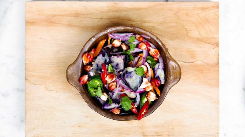 Woman choosing vitamins from a shelf