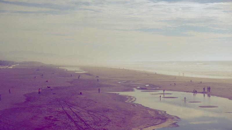 Person stretching on a nature trail