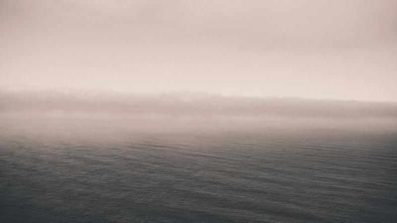 Relaxed person meditating with calm expression