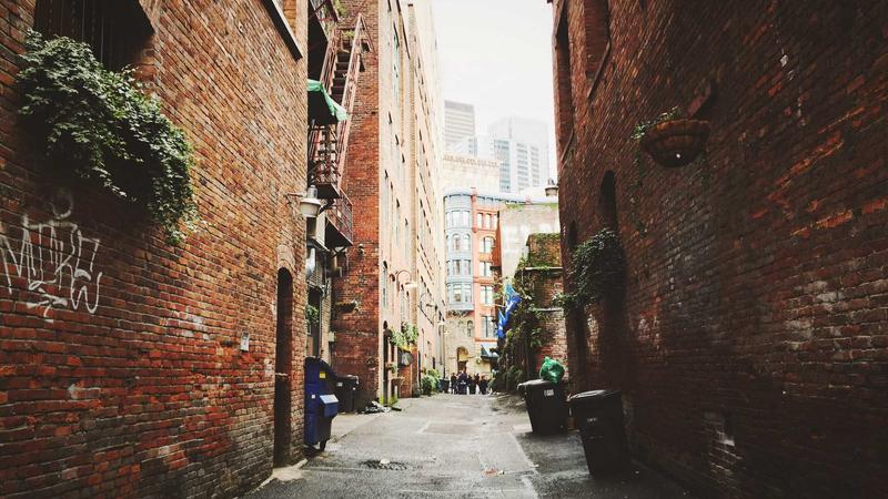 NMN capsules spilling out of a bottle