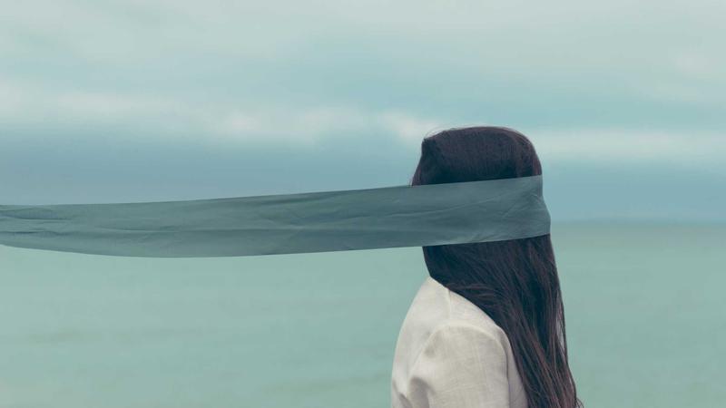 Man flexing muscles at the gym